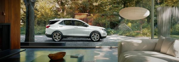 2019 Chevrolet Equinox parked in driveway of house